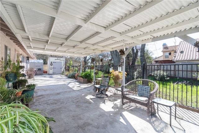 view of patio with fence