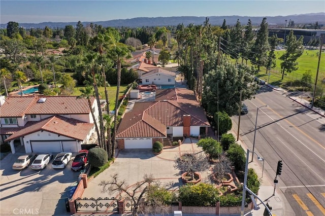 drone / aerial view featuring a mountain view