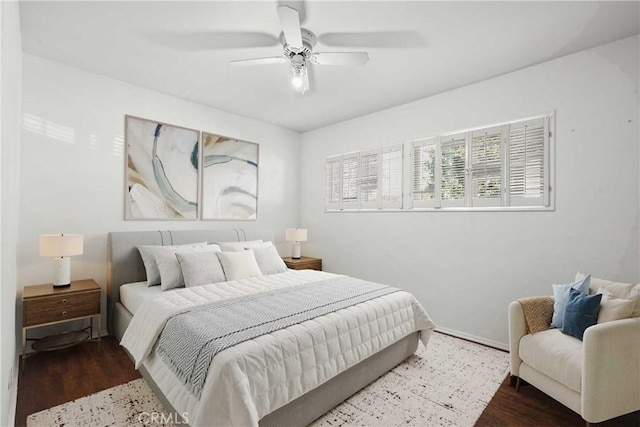 bedroom with ceiling fan and wood finished floors