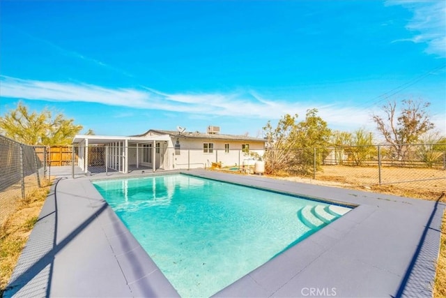 view of swimming pool featuring a fenced in pool and a fenced backyard