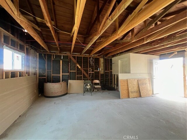 1311 E Olive St, Colton, CA 92324 - miscellaneous room featuring unfinished concrete flooring