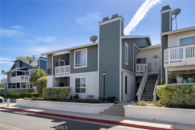 view of property with stairway