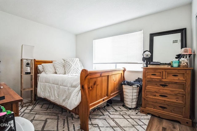 bedroom featuring light wood-type flooring