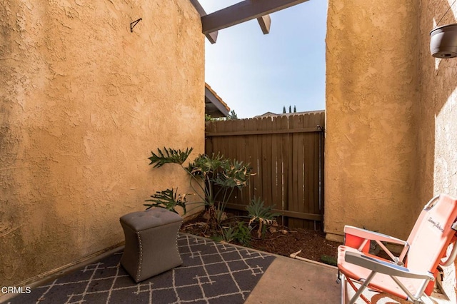 view of patio / terrace with fence