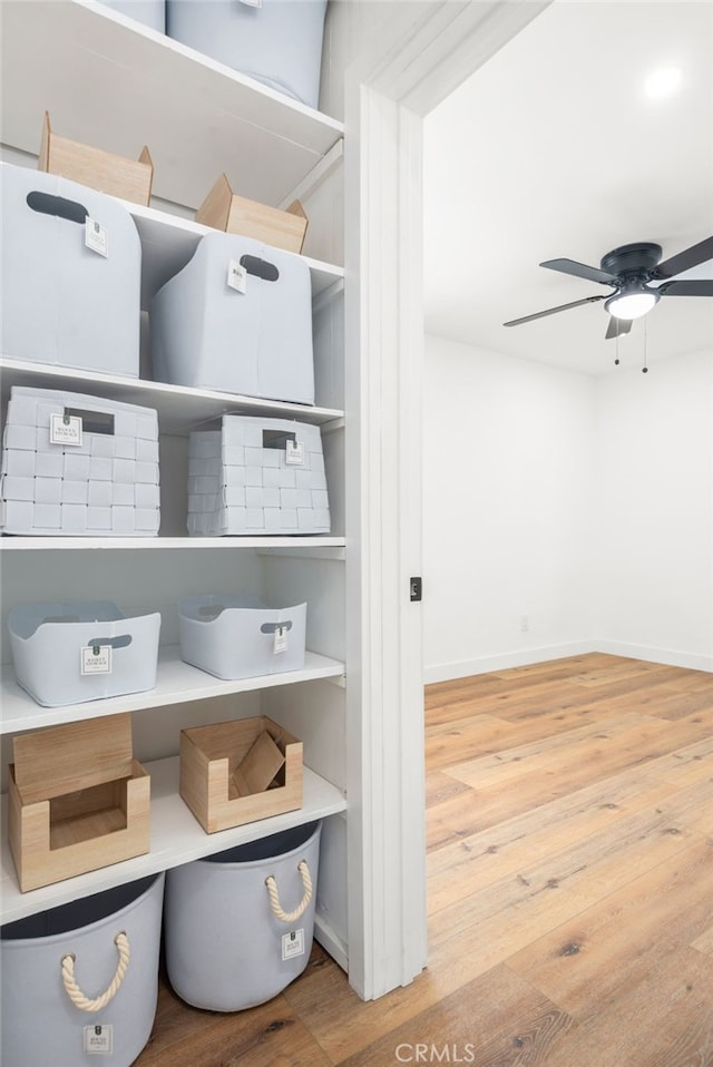 interior space featuring a ceiling fan