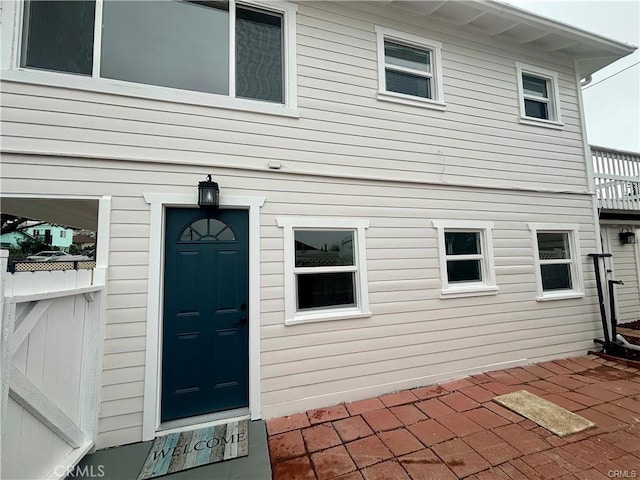 entrance to property with a patio area