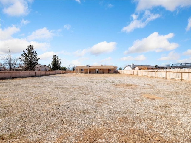 view of yard with fence