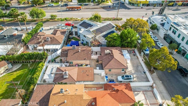 birds eye view of property with a residential view