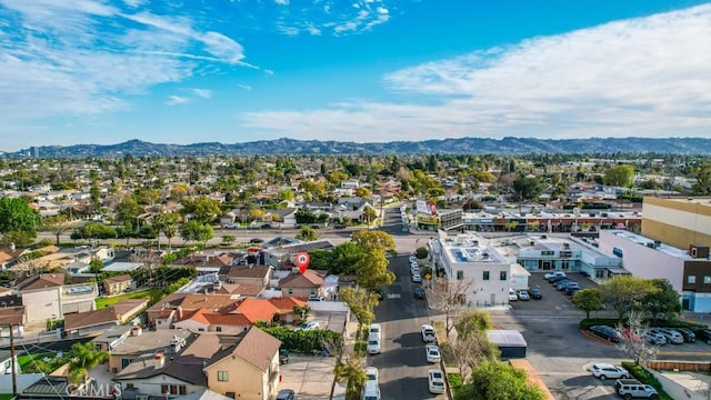 birds eye view of property featuring a residential view and a mountain view