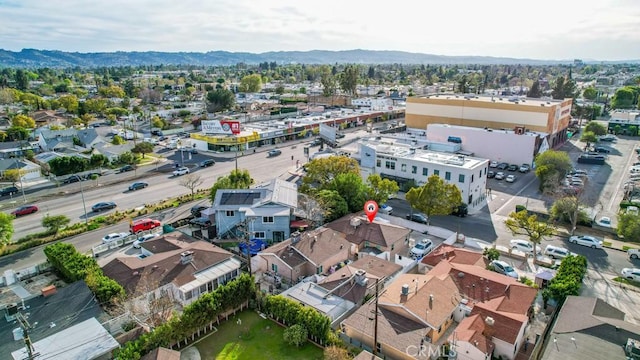 bird's eye view featuring a residential view and a mountain view