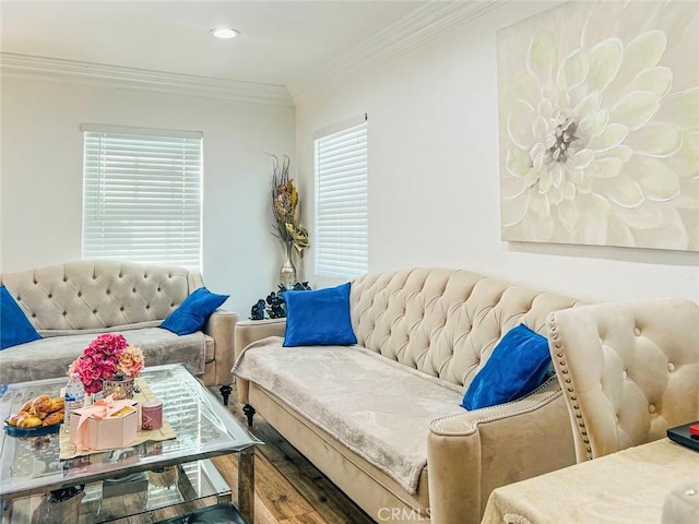 living area with recessed lighting, crown molding, and wood finished floors