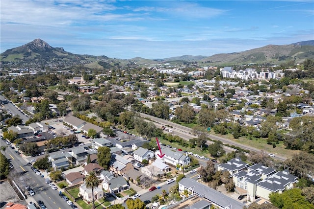 birds eye view of property featuring a residential view and a mountain view