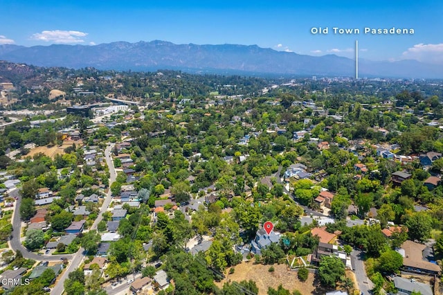 birds eye view of property featuring a mountain view