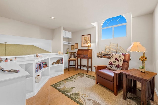 sitting room featuring light wood-type flooring and recessed lighting