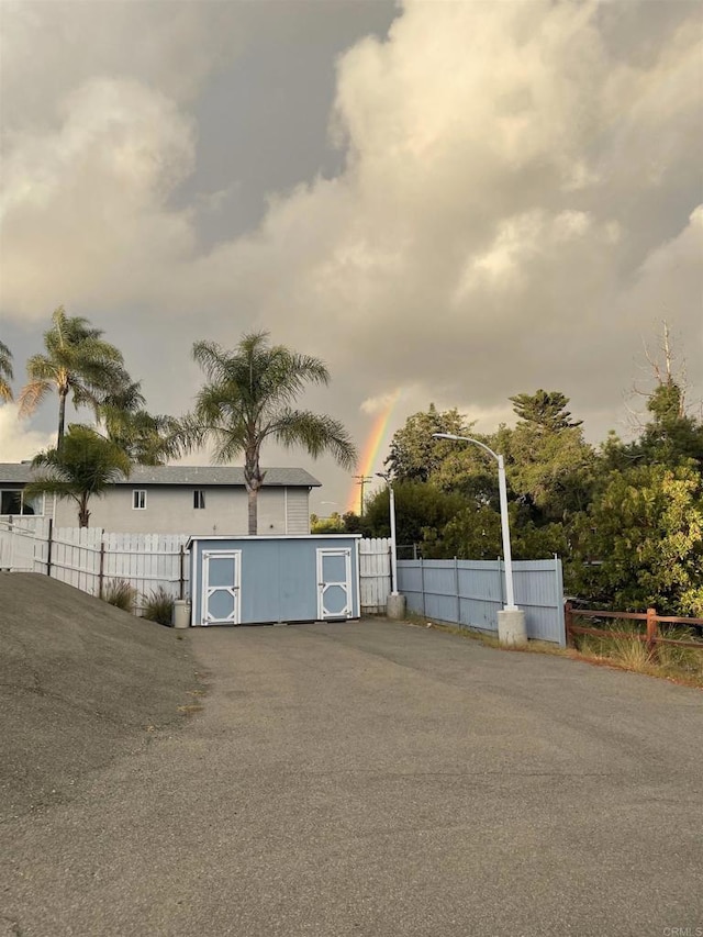 garage with fence