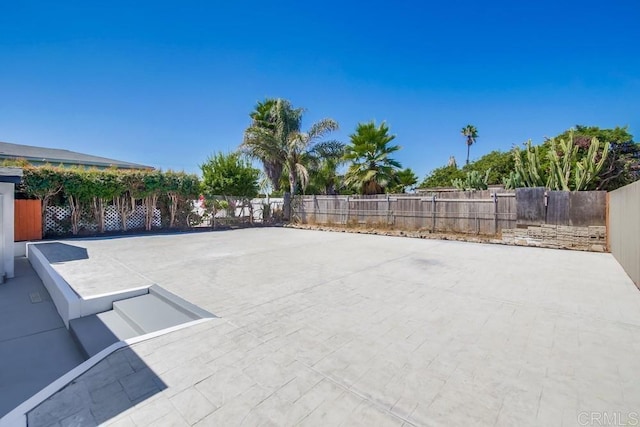 view of patio with fence