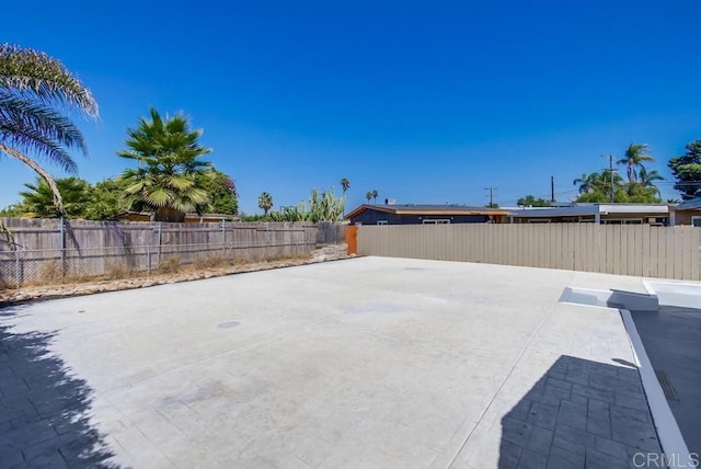 view of patio featuring a fenced backyard