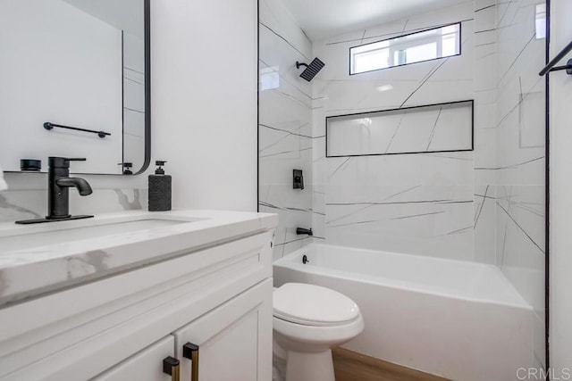 full bath with washtub / shower combination, vanity, toilet, and wood finished floors