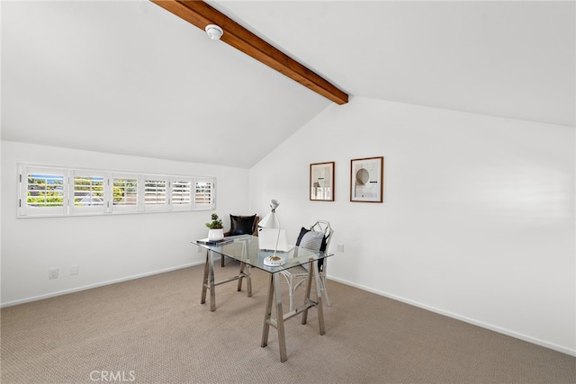 carpeted home office with lofted ceiling with beams and baseboards