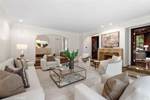 50 Pelican Crest Dr, Newport Coast, CA 92657 - living room with arched walkways, recessed lighting, a fireplace, baseboards, and ornamental molding