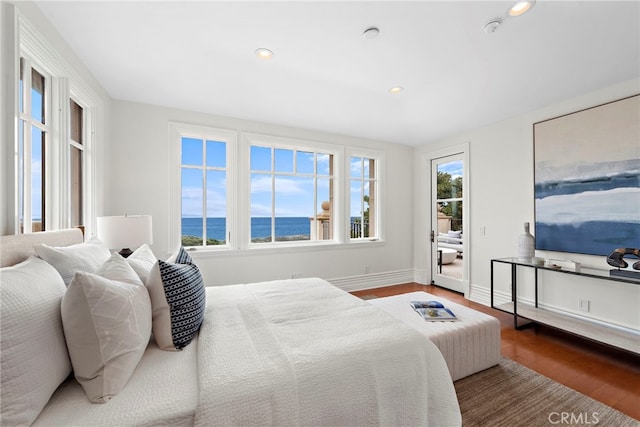 50 Pelican Crest Dr, Newport Coast, CA 92657 - bedroom with access to exterior, baseboards, wood finished floors, and recessed lighting