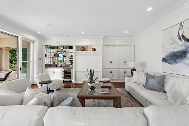 50 Pelican Crest Dr, Newport Coast, CA 92657 - living area with beverage cooler, dark wood finished floors, ornamental molding, a bar, and recessed lighting
