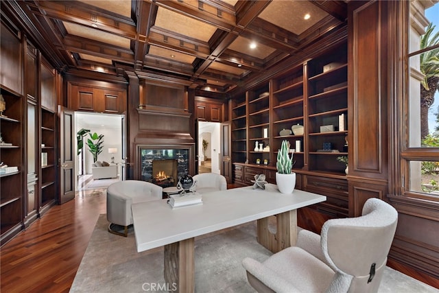 50 Pelican Crest Dr, Newport Coast, CA 92657 - office area featuring wooden walls, coffered ceiling, dark wood-style floors, built in shelves, and a fireplace