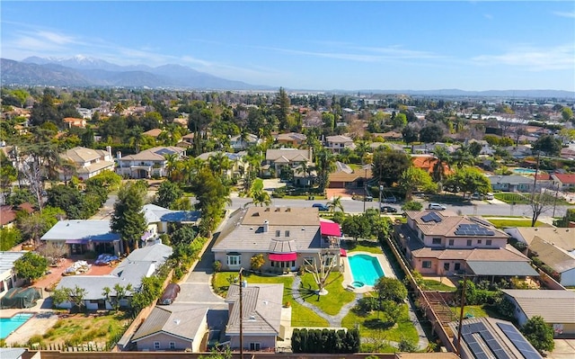 birds eye view of property featuring a residential view and a mountain view