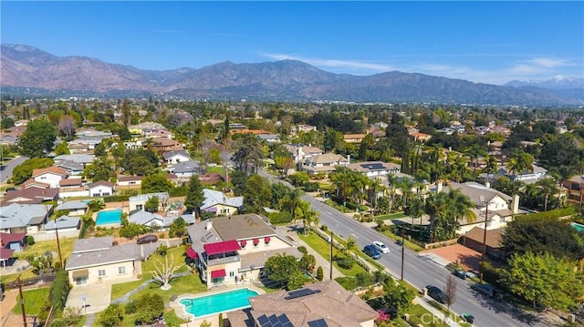 bird's eye view featuring a residential view and a mountain view