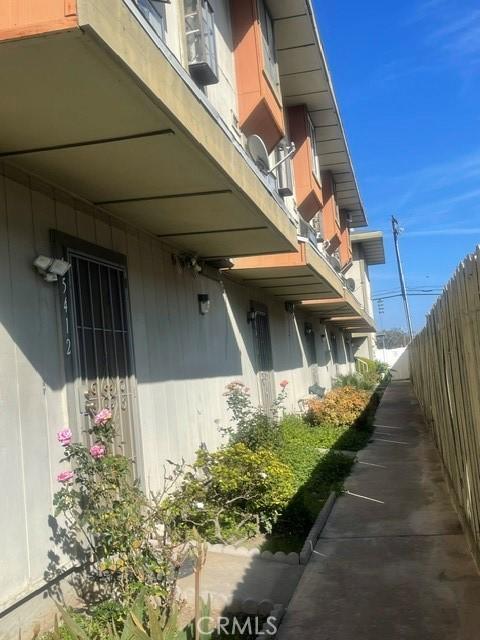 view of property exterior with fence