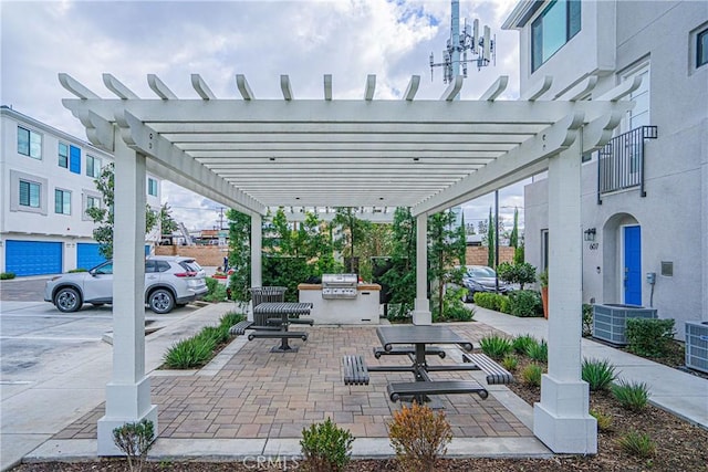 view of patio featuring a pergola, area for grilling, and central air condition unit