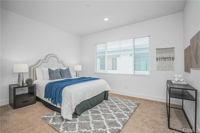 carpeted bedroom with recessed lighting and baseboards