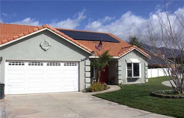 view of front facade with a front lawn, a tiled roof, stucco siding, a garage, and driveway