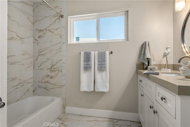 full bath with baseboards, marble finish floor, and vanity