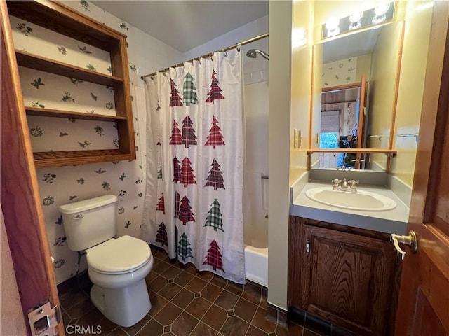 bathroom with shower / tub combo with curtain, vanity, toilet, and tile patterned floors