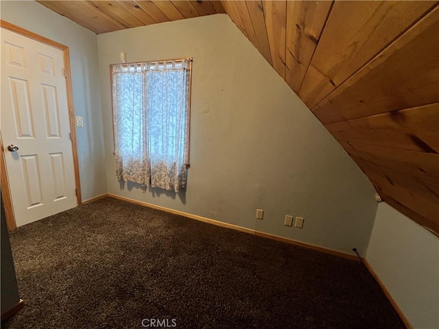 bonus room featuring carpet floors, wood ceiling, and baseboards