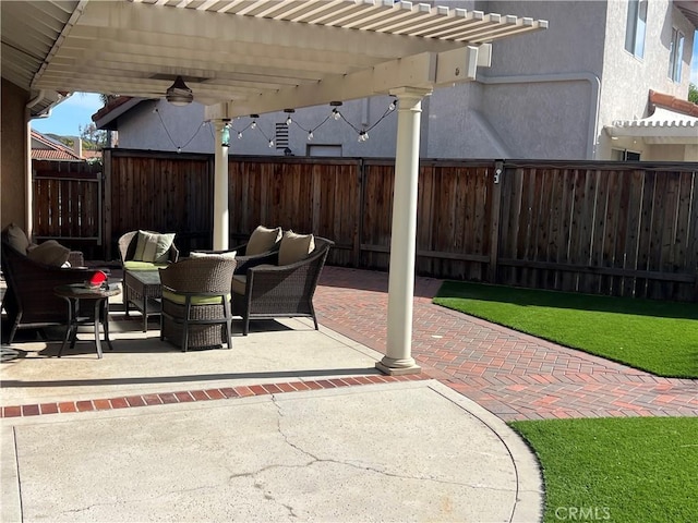 view of patio with fence and a pergola