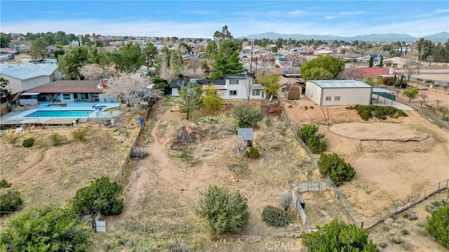 drone / aerial view with a residential view and a mountain view