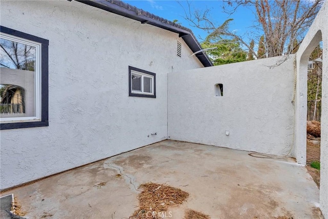 view of home's exterior featuring a patio area and stucco siding