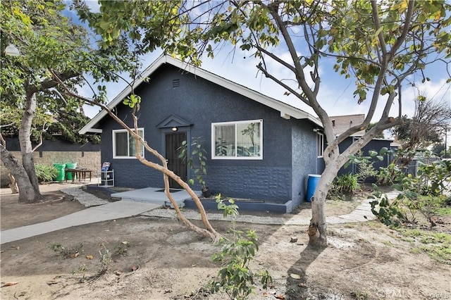 view of front of house with stucco siding