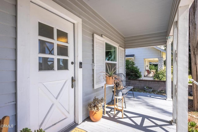 entrance to property with covered porch