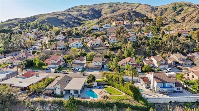 bird's eye view featuring a residential view and a mountain view