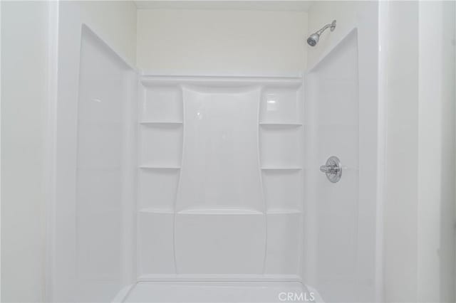 full bath featuring walk in shower