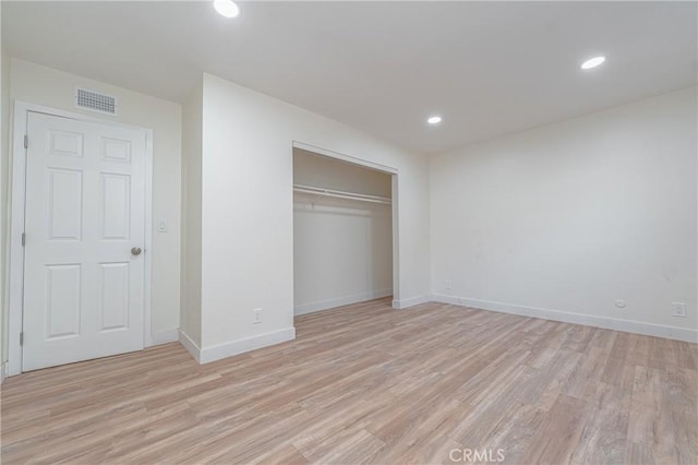 unfurnished bedroom with recessed lighting, baseboards, visible vents, and light wood finished floors