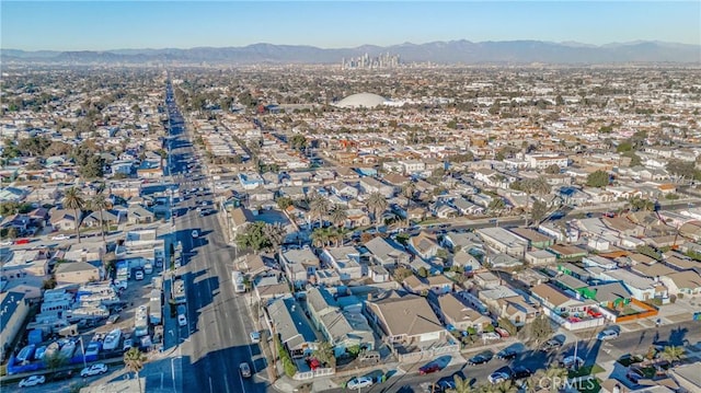 birds eye view of property with a residential view and a mountain view