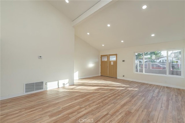 unfurnished living room featuring baseboards, visible vents, light wood-type flooring, high vaulted ceiling, and recessed lighting