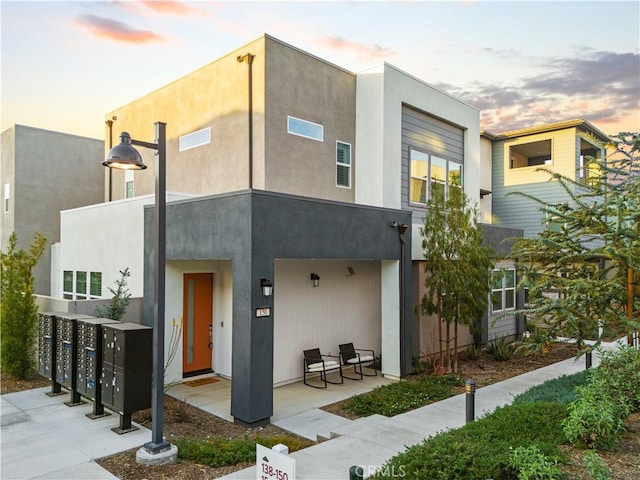 view of property at dusk