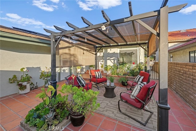 view of patio / terrace with fence and a pergola