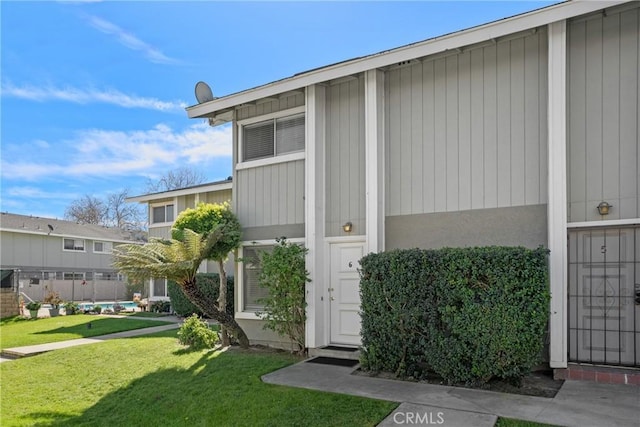 view of home's exterior featuring a lawn