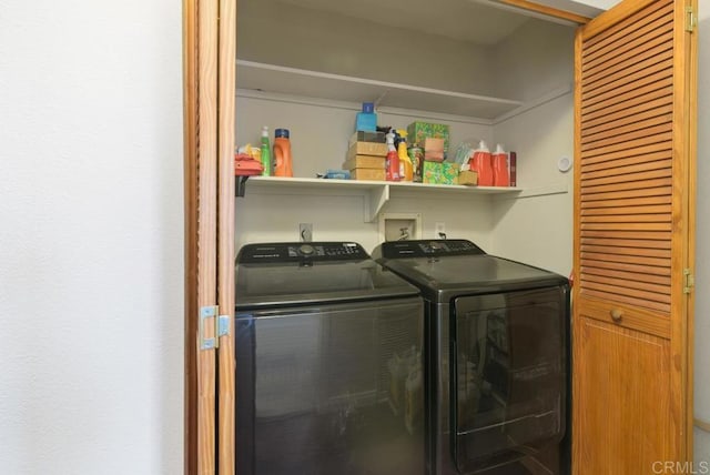 laundry room featuring laundry area and washing machine and clothes dryer